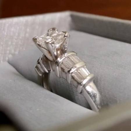 Diamond Engagement Ring In Platinum Setting With Side Baguettes